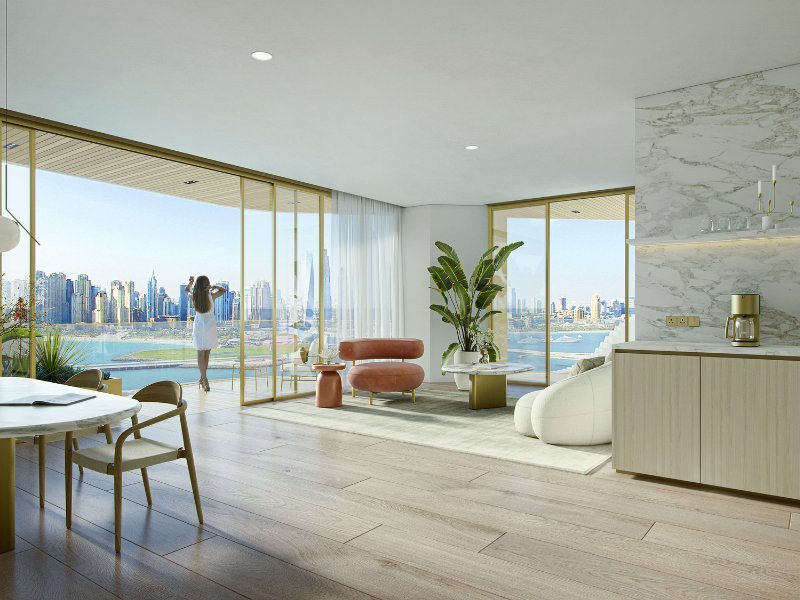 Elegant waterfront living area in Dubai with an open-concept design, stylish modern furnishings, and seamless access to a spacious terrace overlooking the marina, offering breathtaking views and indoor-outdoor luxury living.