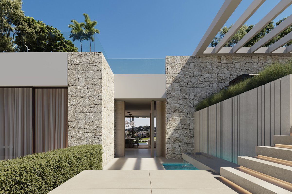 Grand entrance of a frontline golf villa in Marbella, featuring an elegant modern design with a spacious, welcoming foyer, large glass doors, and a seamless connection to the villa's luxurious surroundings, offering a glimpse of the lush golf course beyond.