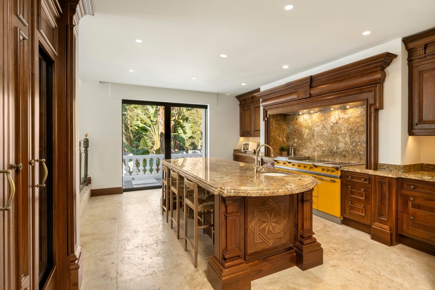 Exquisite kitchen in a majestic Andalusian palace in Marbella, featuring a blend of traditional Andalusian charm and modern luxury, with high-end appliances, intricate design details, and spacious countertops, creating an elegant and functional space for culinary creativity.