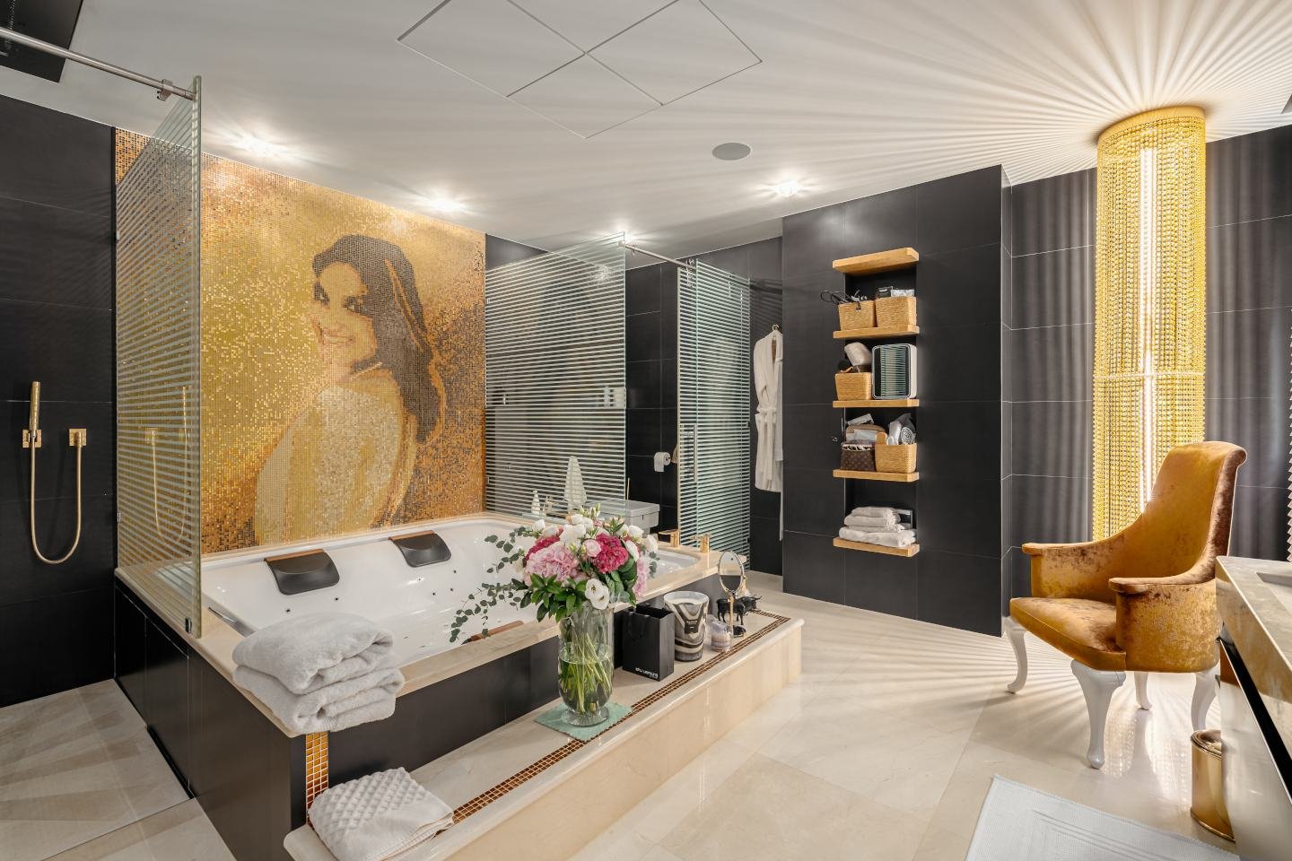 Elegant bathroom in a luxury villa in Las Chapas, Marbella, featuring a luxurious freestanding bathtub, modern fixtures, and sophisticated marble finishes. Soft lighting enhances the serene and tranquil atmosphere, making it the perfect space for relaxation in a timeless, stylish setting.
